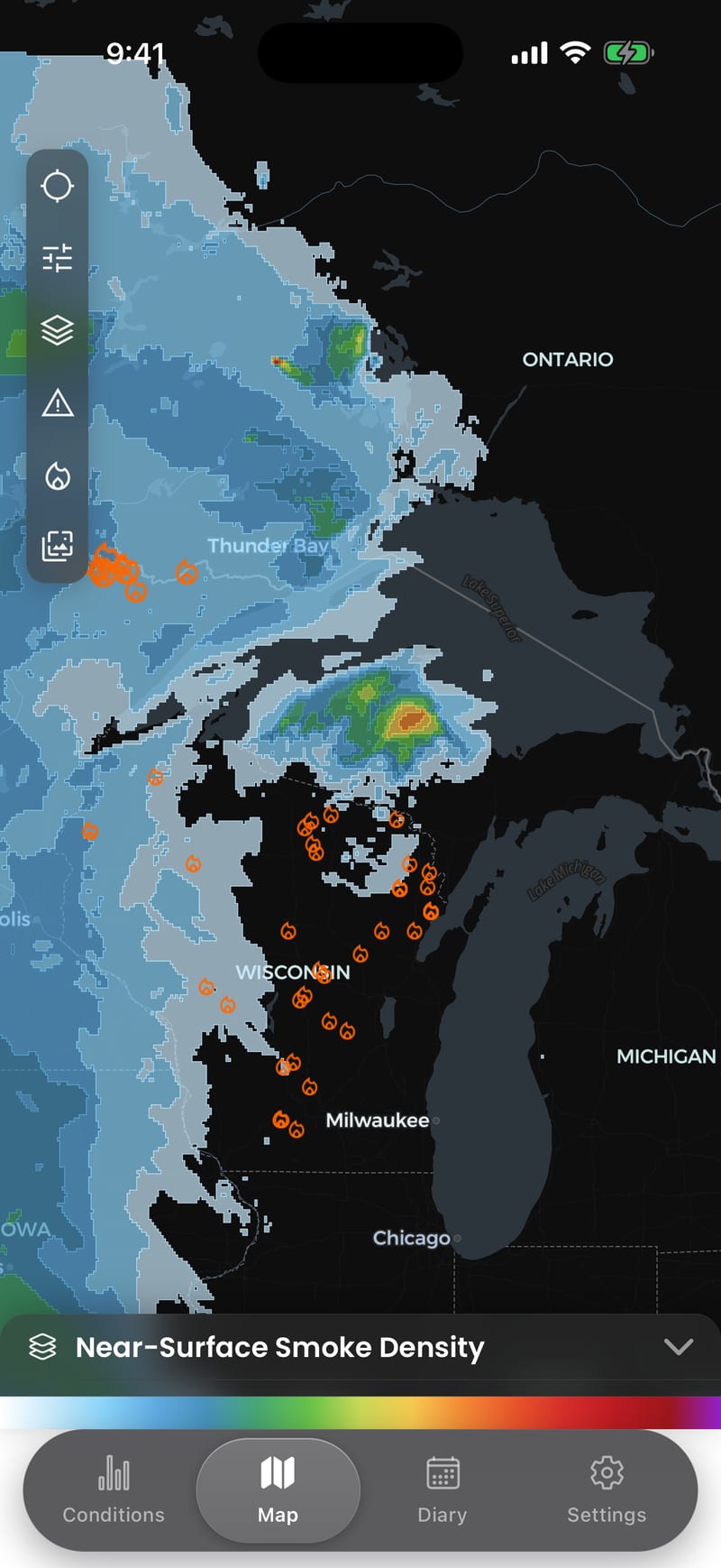 AirScope's map showing near-surface smoke density over the Great Lakes, with satellite fire detections marked across Ontario and Wisconsin.